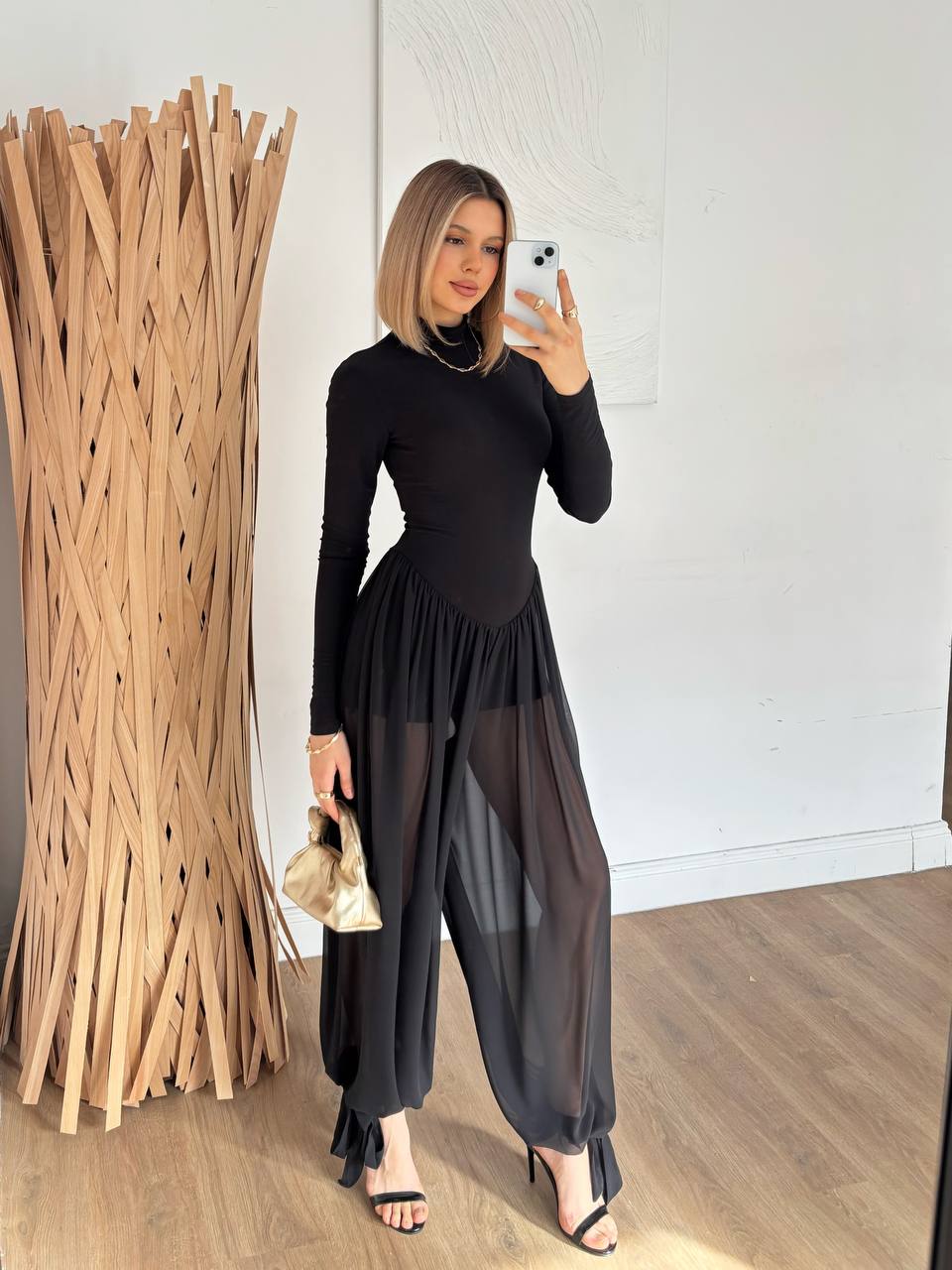 Combinaison Pantalon Col Roulé Noir avec Jambes Transparentes en Mousseline